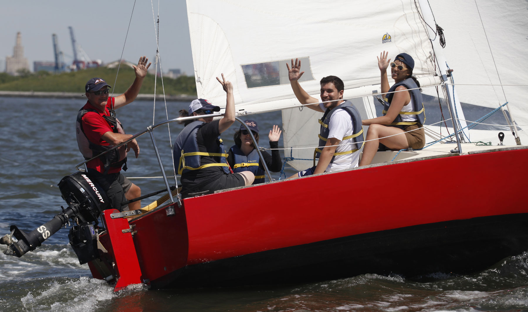 students waving